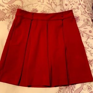 Red mini skirt with side pockets